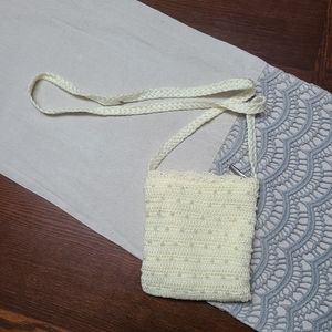 Crocheted crossbody bag with faux pearls